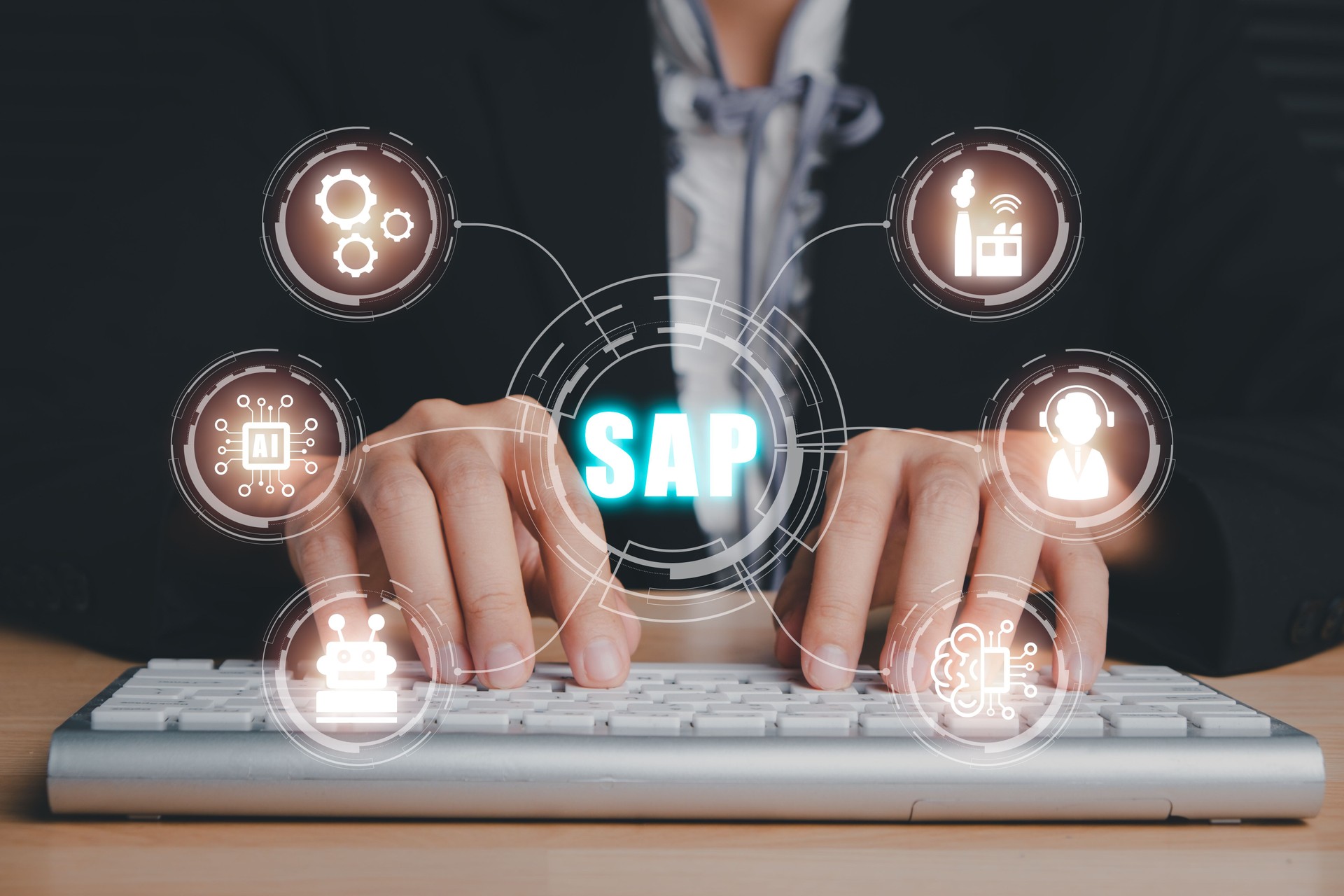 SAP - Business process automation software and management software (SAP), Person hand typing on keyboard with ERP enterprise resources planning system concept on virtual screen.